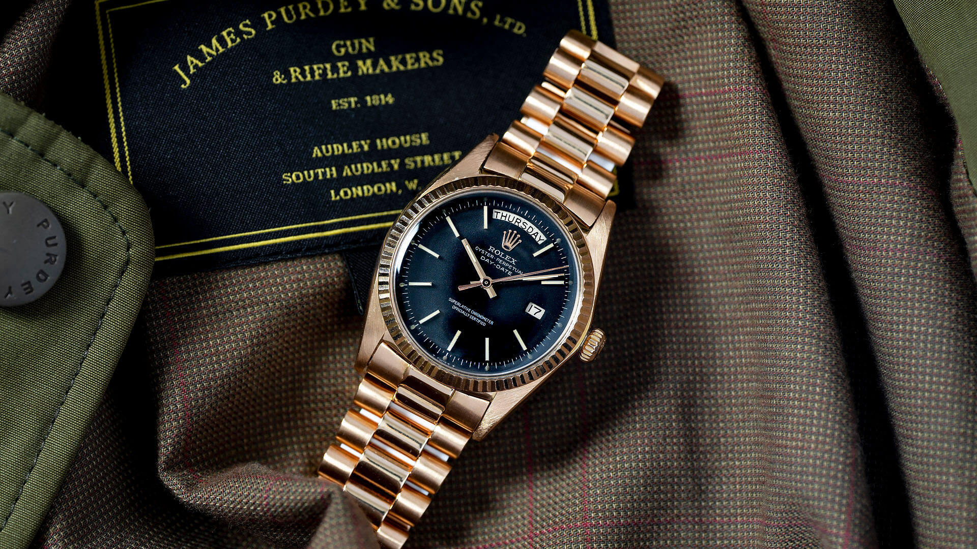 rolex day date gold blue